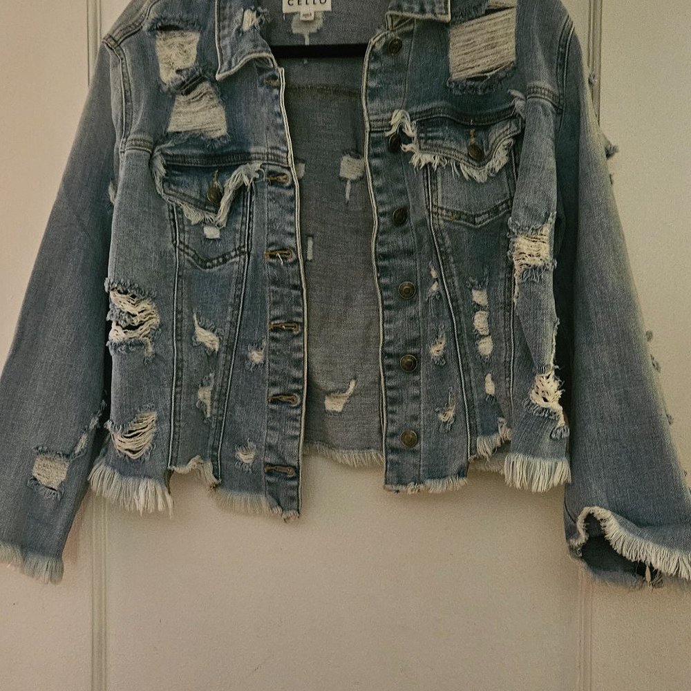 Distressed denim jacket